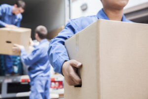 Movers unloading a moving truck